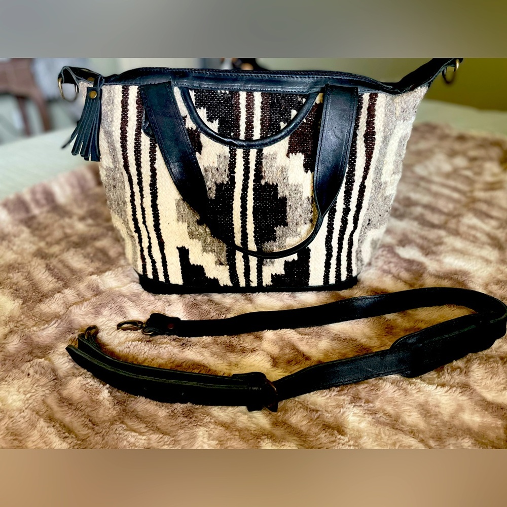 Non-branded leather and wool purse.